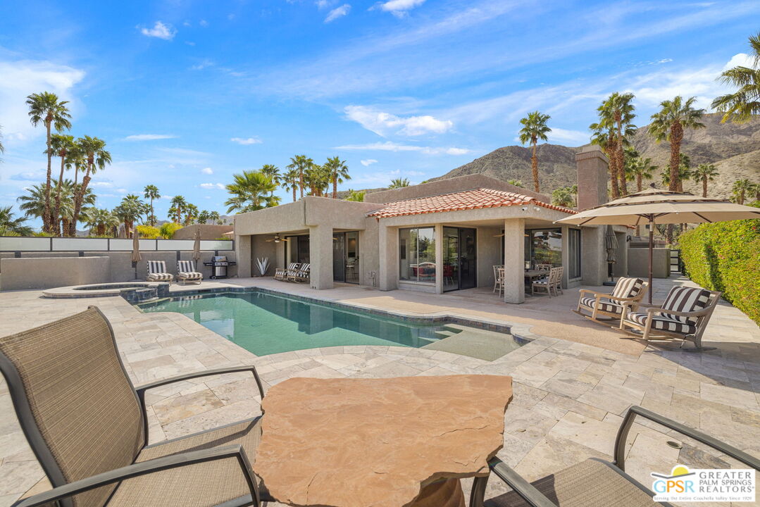 8 Alta Vista Rancho Mirage, CA 92270 - Photo 3 of 46 a view of a house with backyard sitting area and furniture