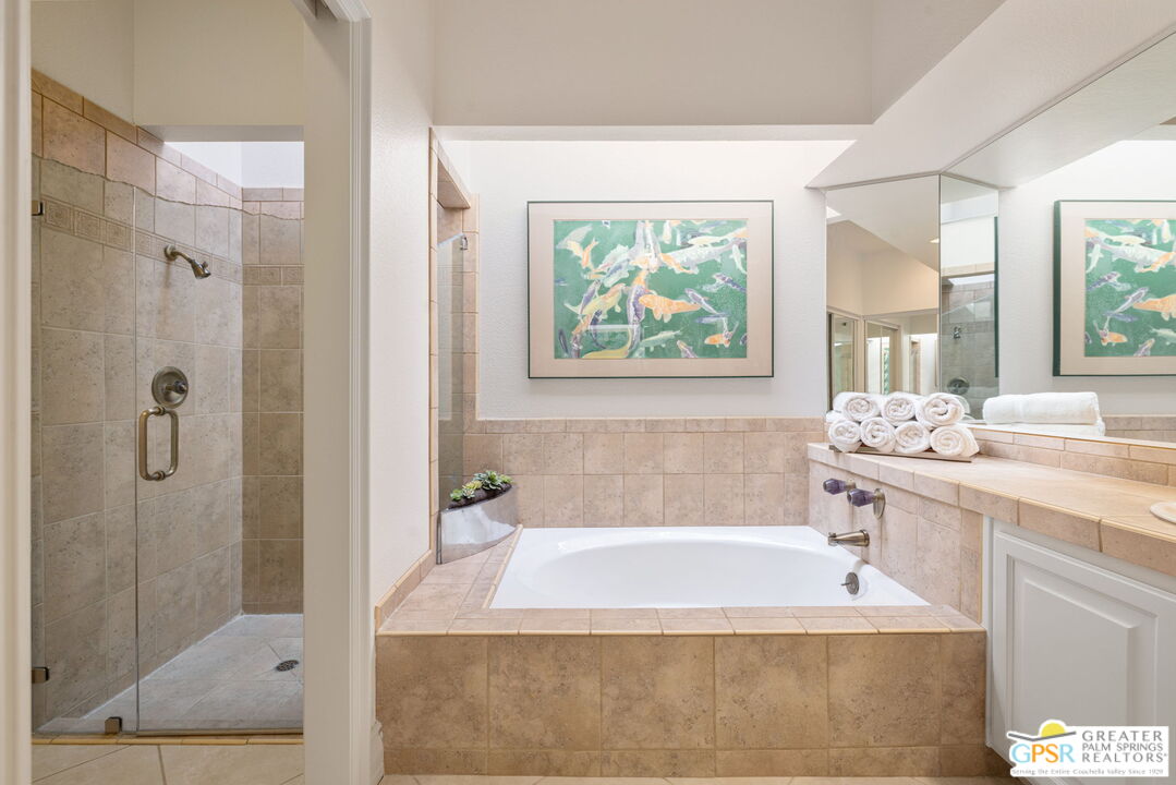 8 Alta Vista Rancho Mirage, CA 92270 - Photo 37 of 46 a spacious bathroom with sink shower and bathtub