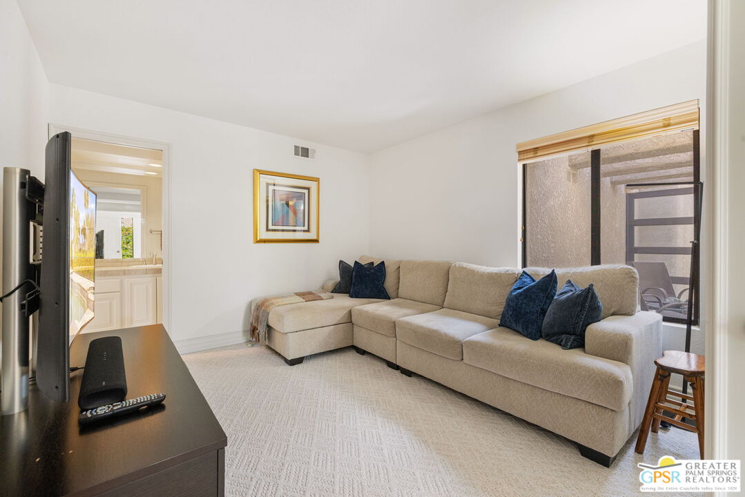 8 Alta Vista Rancho Mirage, CA 92270 - Photo 43 of 46 a living room with furniture and a couch