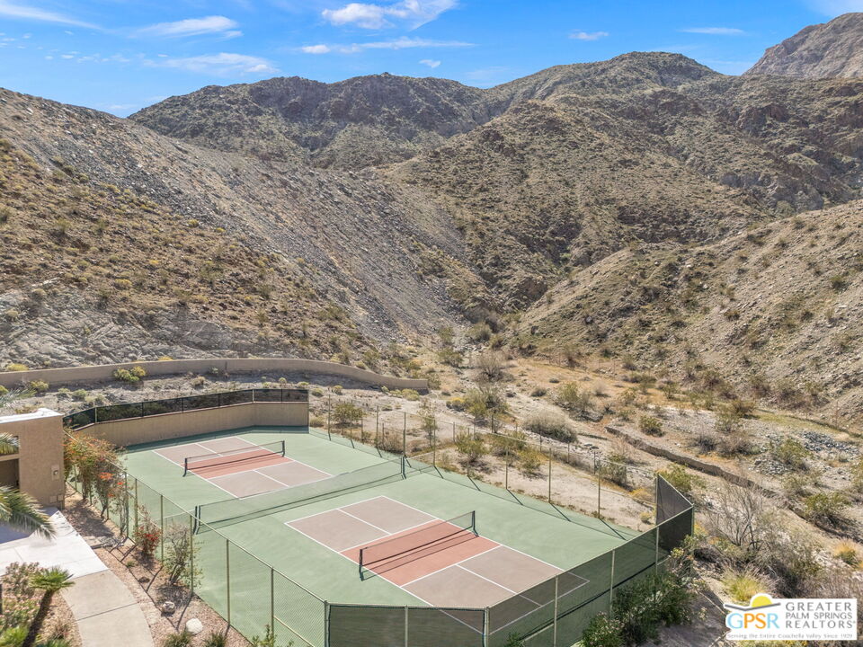 8 Alta Vista Rancho Mirage, CA 92270 - Photo 8 of 46 an aerial view of residential houses with outdoor space and trees
