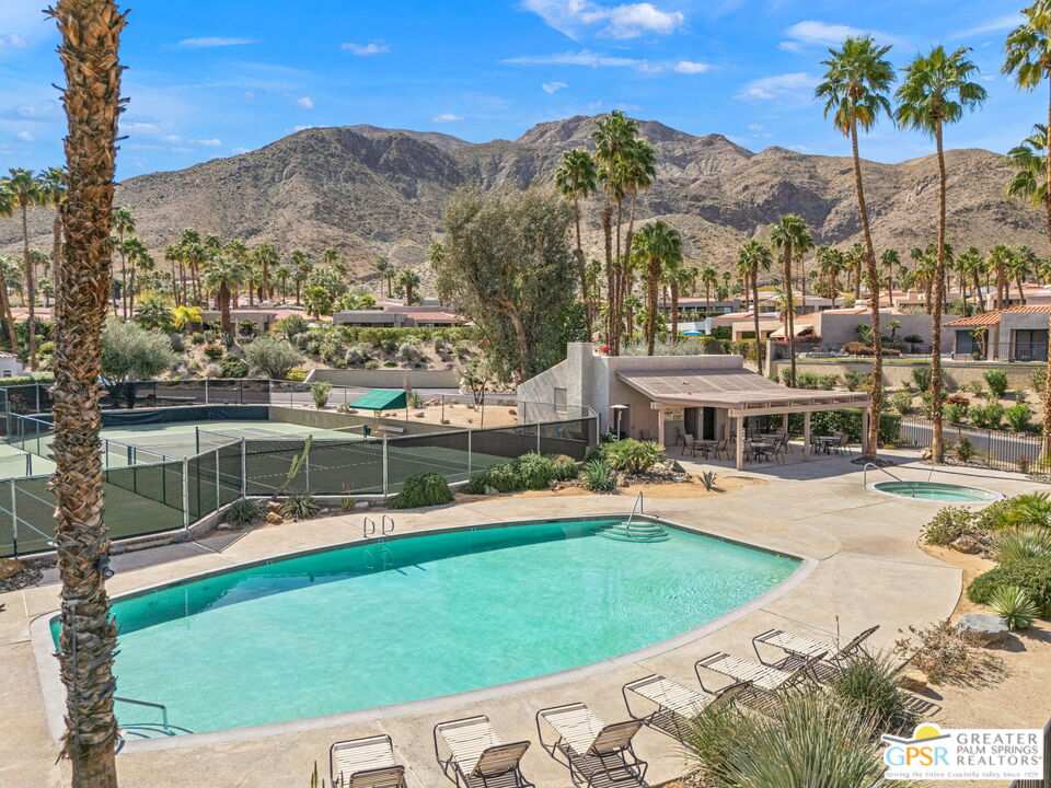 8 Alta Vista Rancho Mirage, CA 92270 - Photo 9 of 46 a view of a swimming pool with a lake view