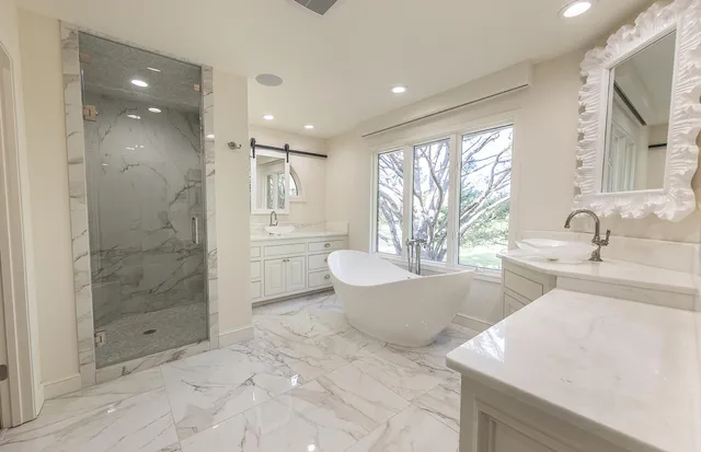 a view of a wooden deck besides a house