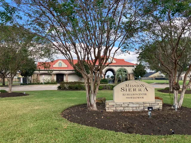a sign on the side of a house