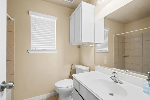 a bathroom with a sink and a toilet
