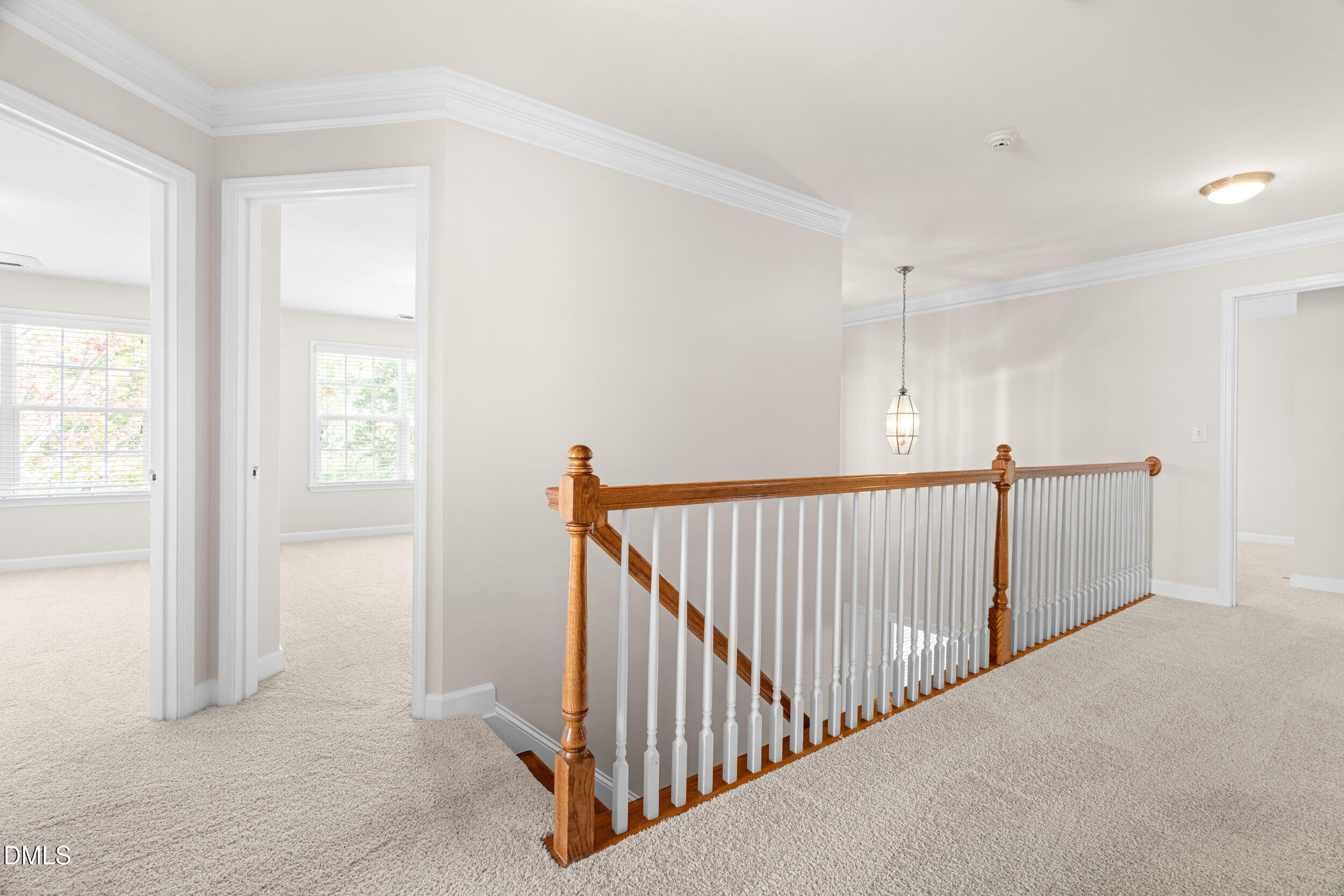 5708 Catskill Court Durham, NC 27713 - Photo 20 of 39 a view of a hallway view with windows