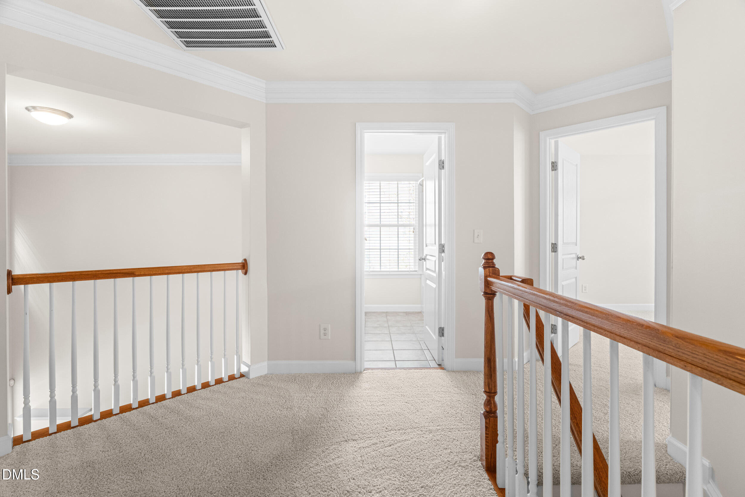 5708 Catskill Court Durham, NC 27713 - Photo 31 of 39 a view of a hallway with windows