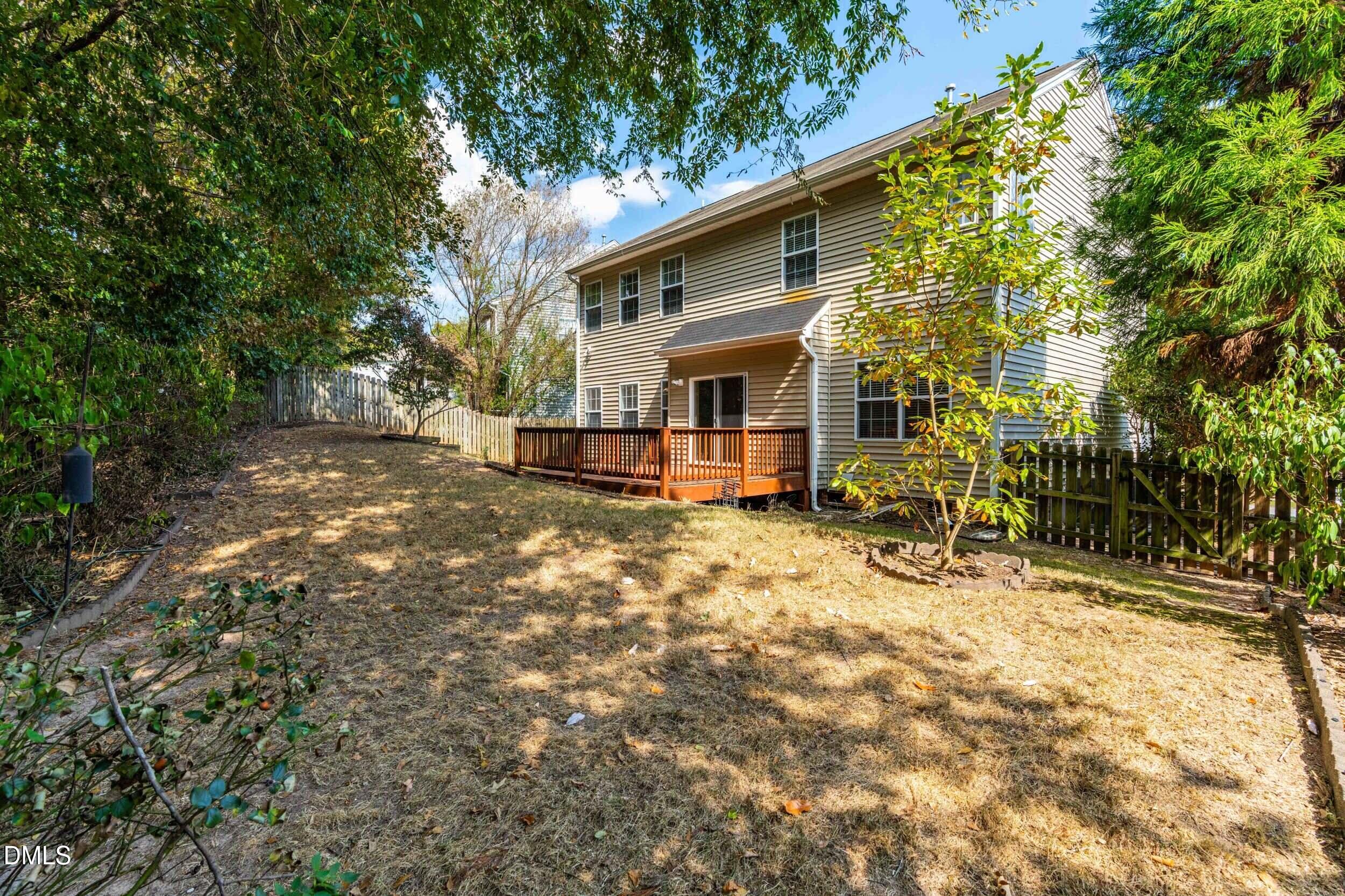 5708 Catskill Court Durham, NC 27713 - Photo 33 of 39 a view of a house with a yard