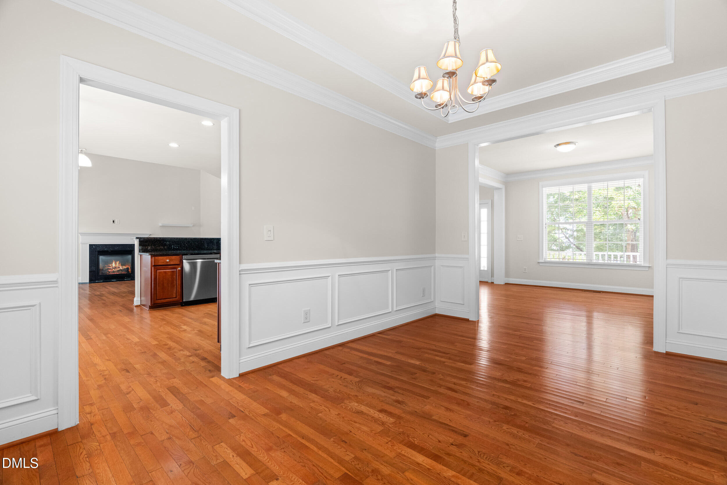 5708 Catskill Court Durham, NC 27713 - Photo 9 of 39 wooden floor in an empty room with a window
