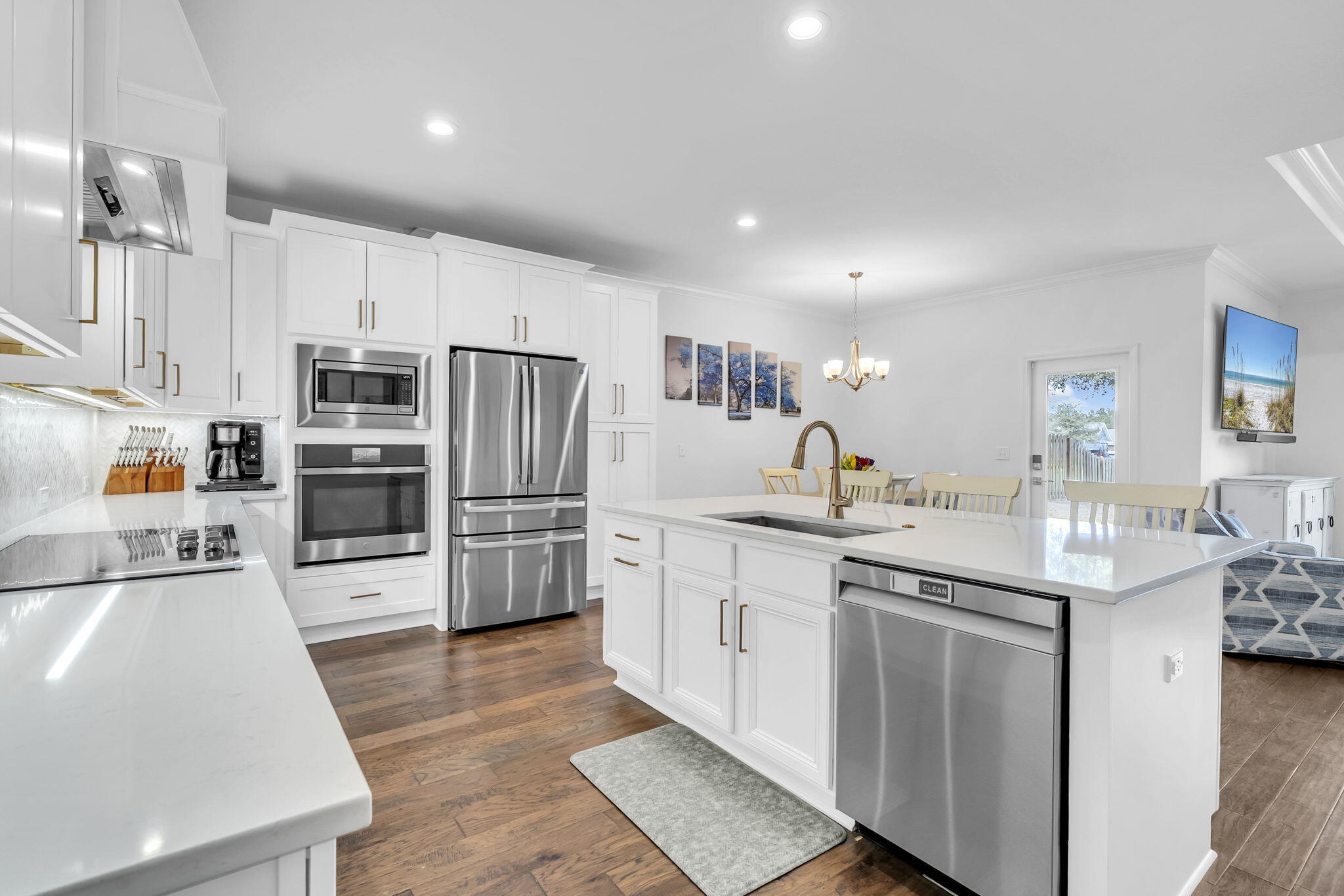 106 Mary Ellen Way Freeport, FL 32439 - Photo 14 of 79 a kitchen with stainless steel appliances a sink stove and refrigerator