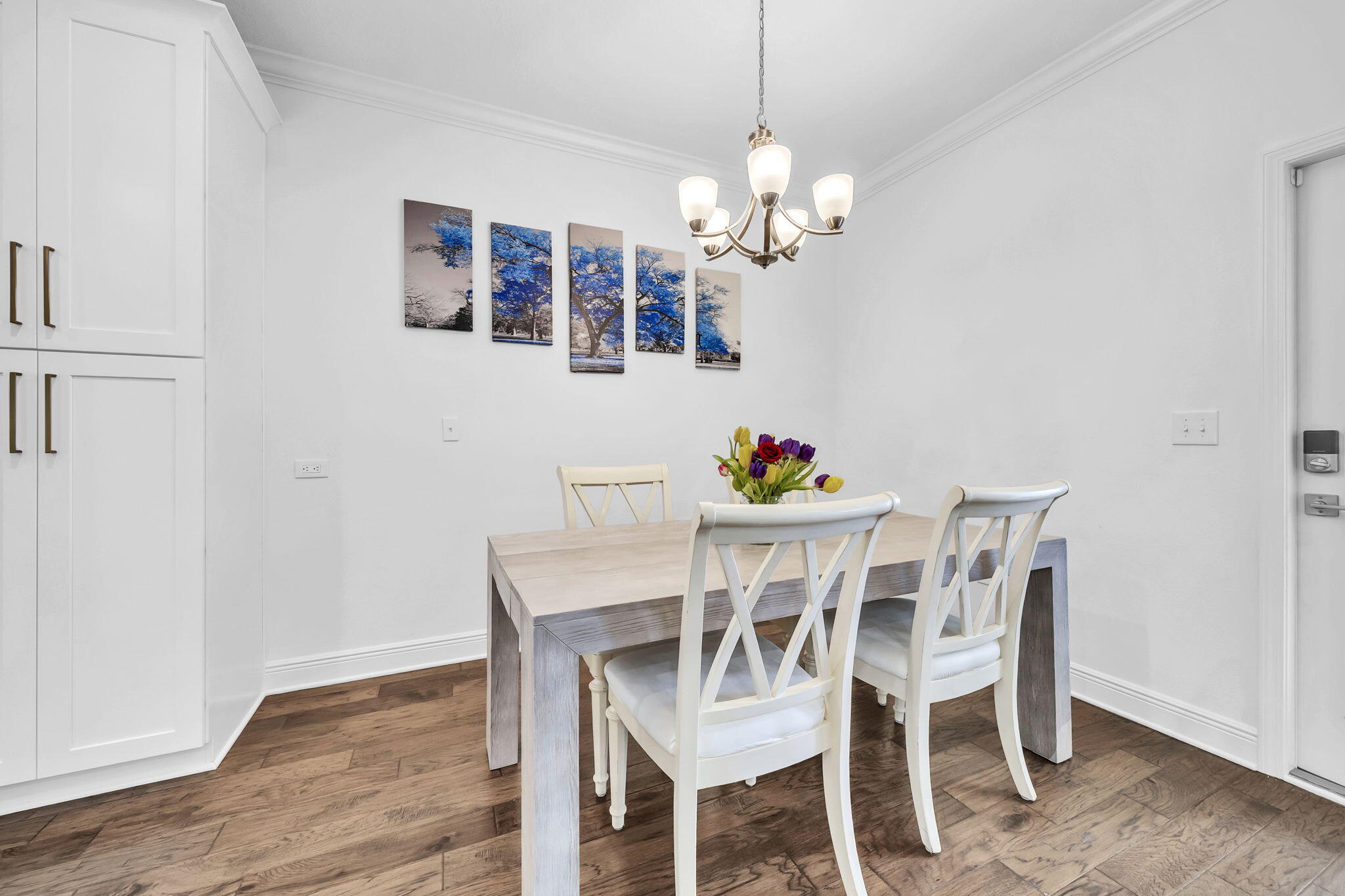 106 Mary Ellen Way Freeport, FL 32439 - Photo 15 of 79 a view of a dining room with furniture and wooden floor