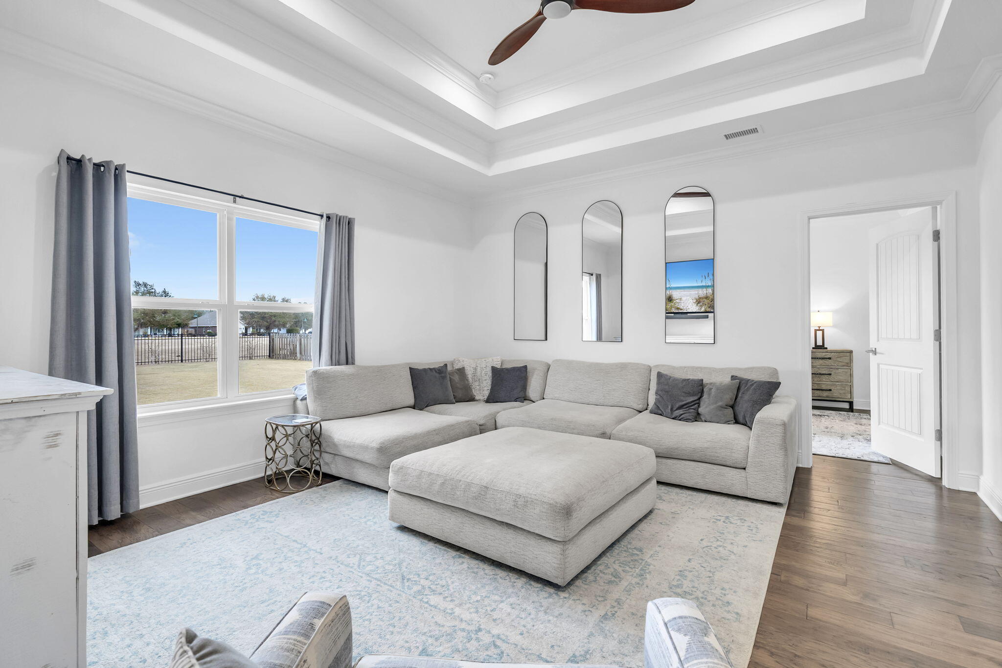 106 Mary Ellen Way Freeport, FL 32439 - Photo 16 of 79 a living room with furniture and a large window
