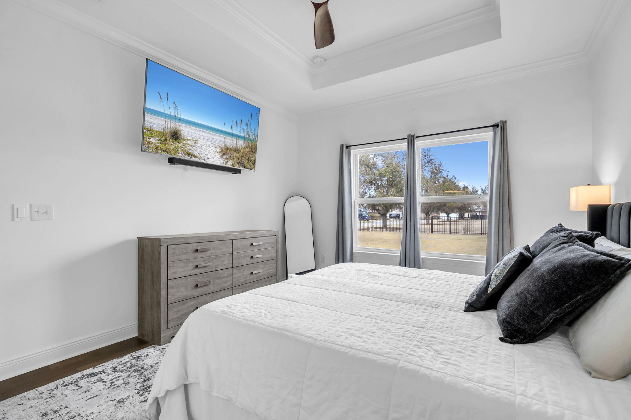 106 Mary Ellen Way Freeport, FL 32439 - Photo 20 of 79 a bedroom with a bed and a large window