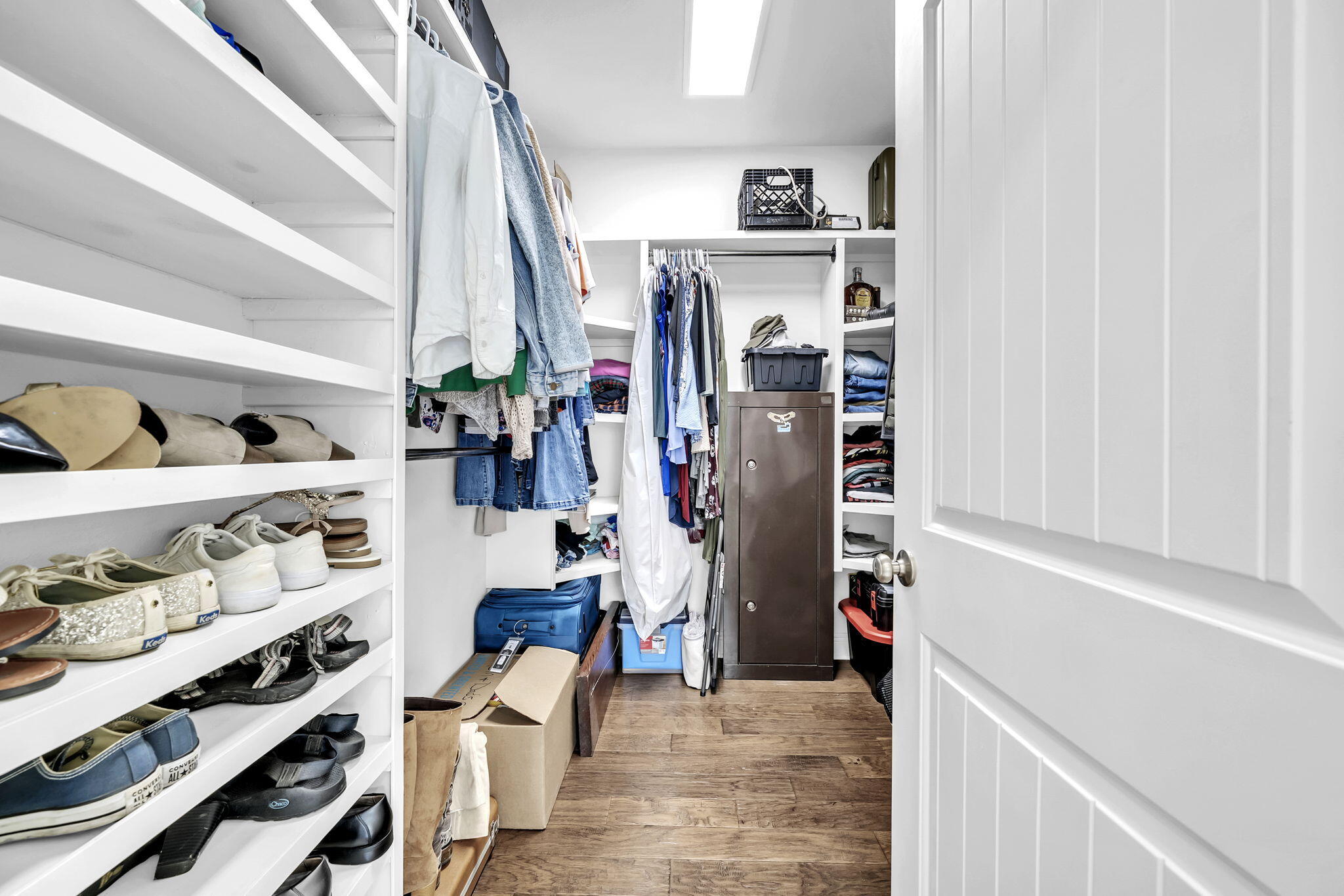 106 Mary Ellen Way Freeport, FL 32439 - Photo 27 of 79 a view of walk in closet with clothes and shoes