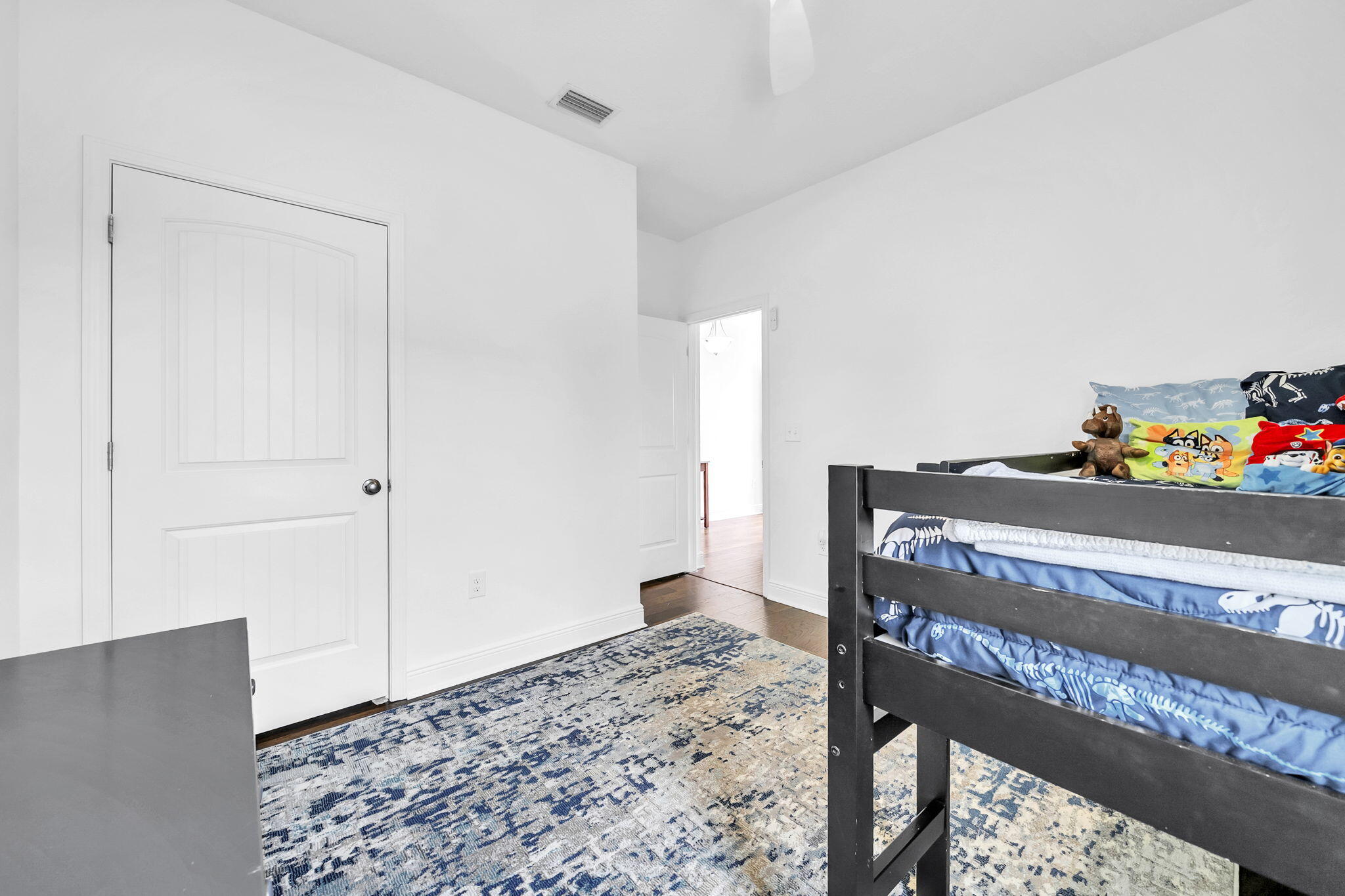 106 Mary Ellen Way Freeport, FL 32439 - Photo 32 of 79 a bedroom with a bed and cabinets