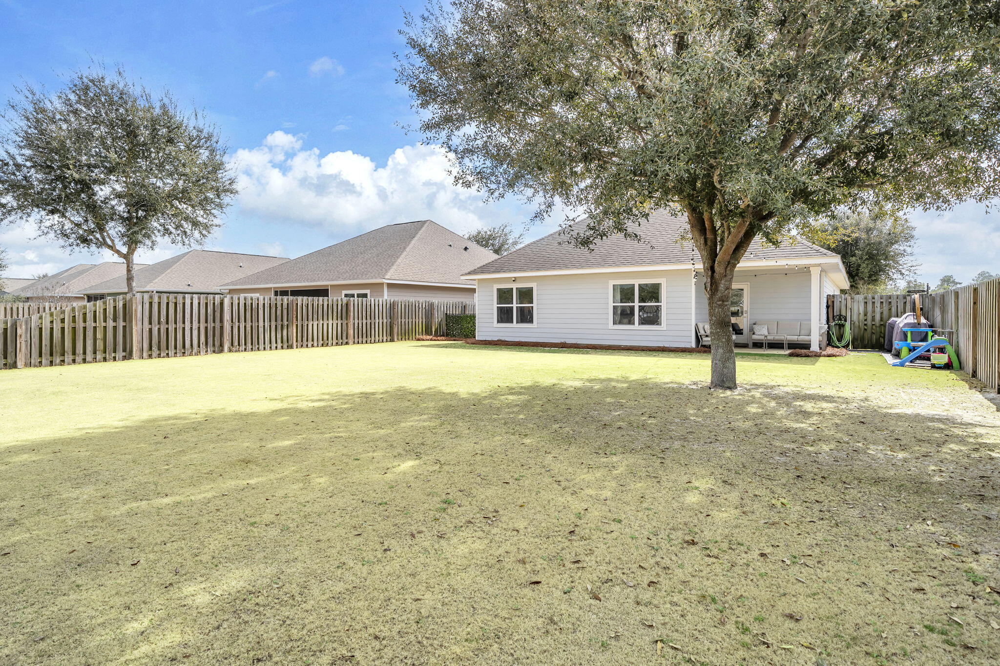 106 Mary Ellen Way Freeport, FL 32439 - Photo 42 of 79 a view of a house with a yard