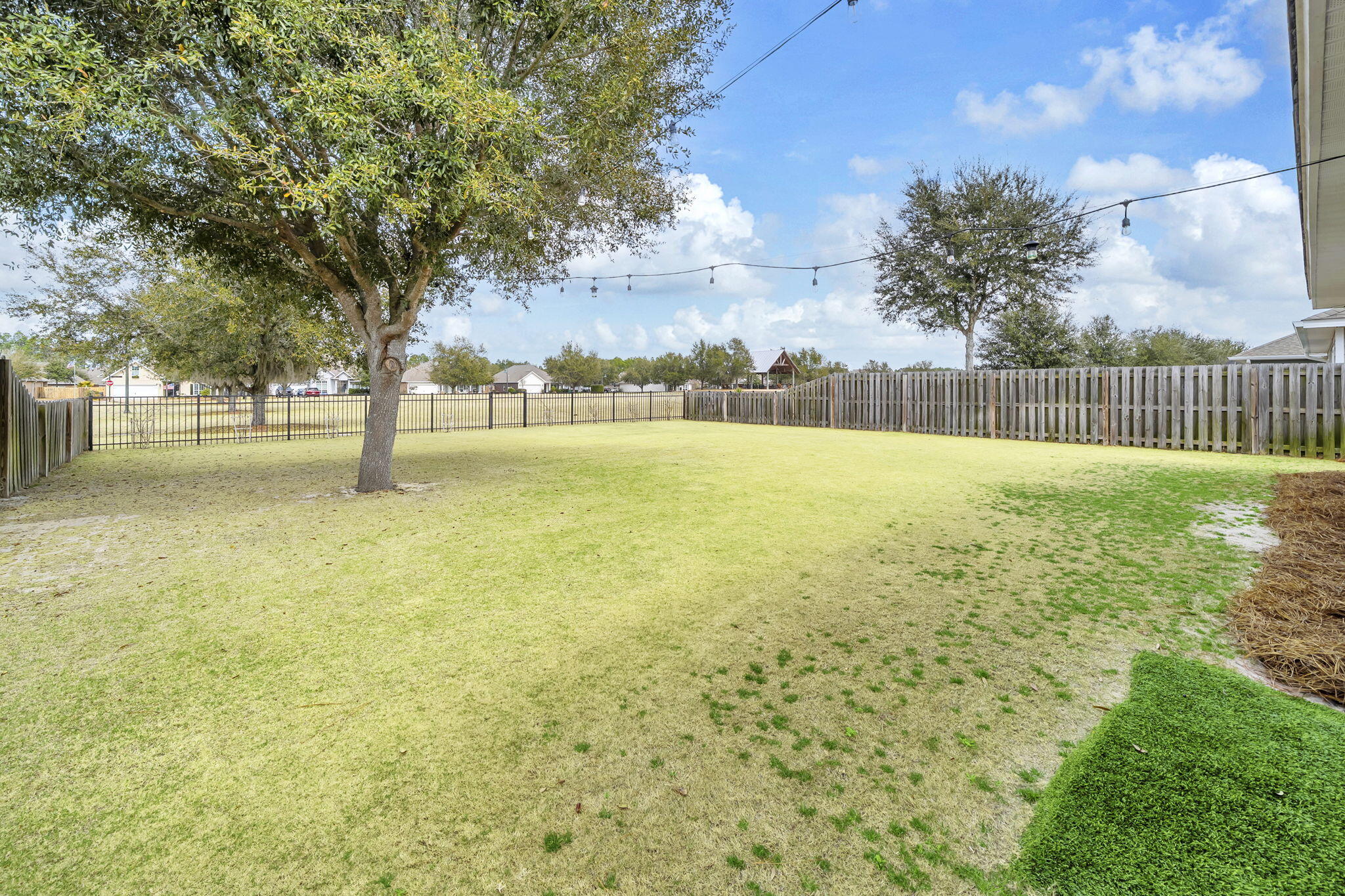 106 Mary Ellen Way Freeport, FL 32439 - Photo 47 of 79 a view of yard with swimming pool and green space