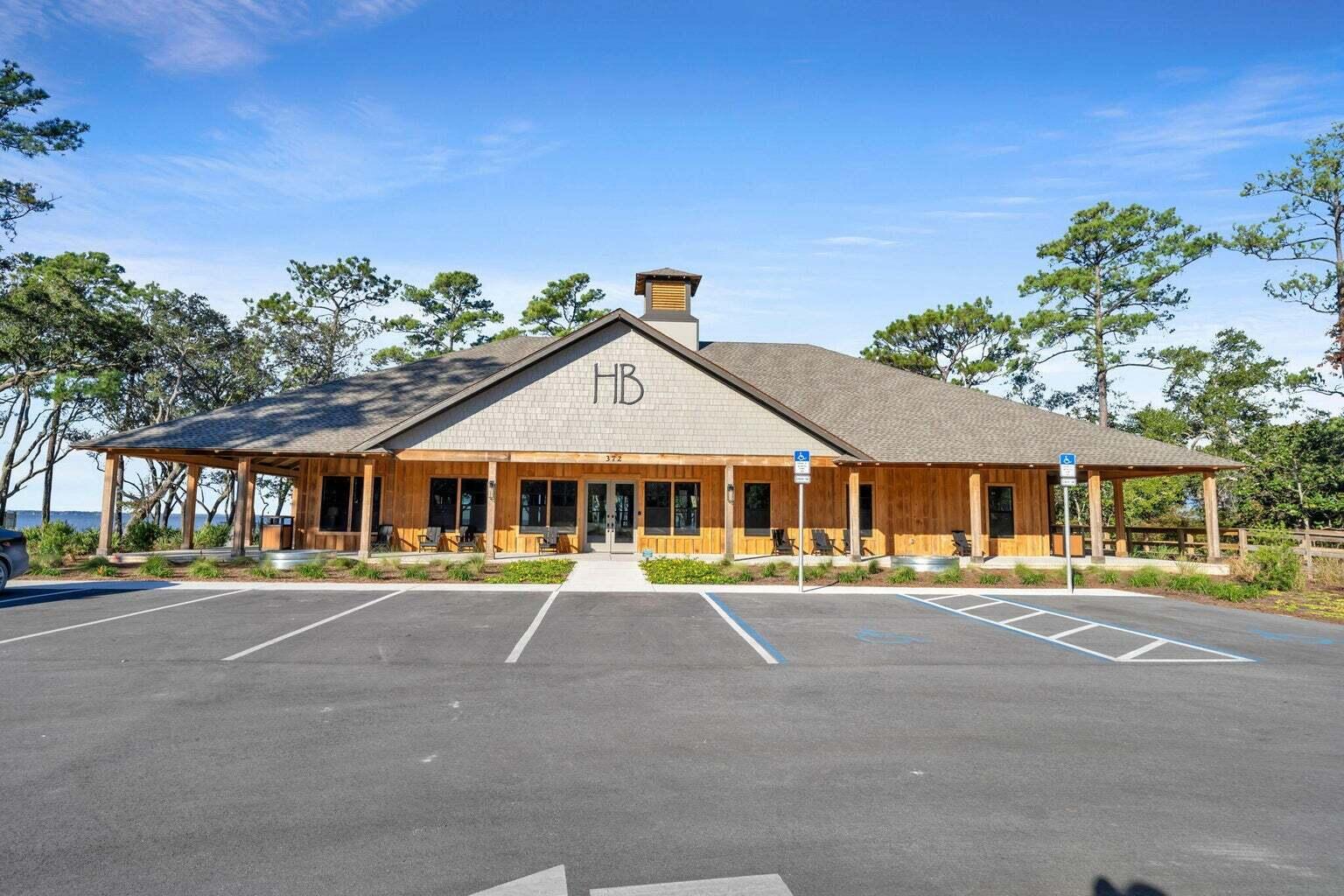 106 Mary Ellen Way Freeport, FL 32439 - Photo 61 of 79 a front view of a building with many trees