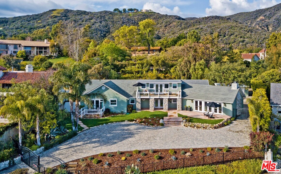 20779 Big Rock Drive Malibu, CA 90265 - Photo 2 of 37 an aerial view of residential houses with outdoor space and trees