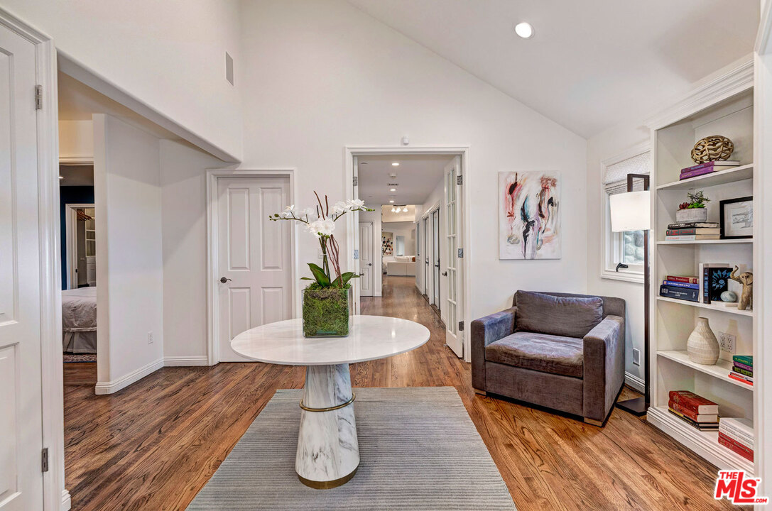 20779 Big Rock Drive Malibu, CA 90265 - Photo 14 of 37 a living room with furniture and a wooden floor
