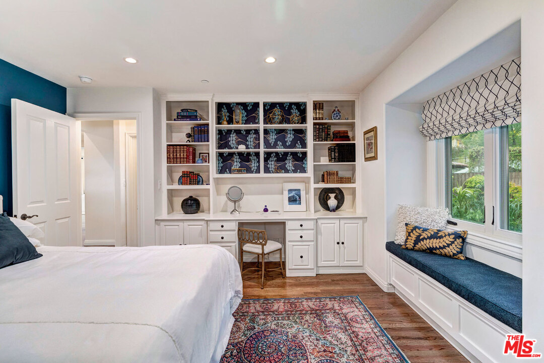 20779 Big Rock Drive Malibu, CA 90265 - Photo 21 of 37 a bedroom with a large bed and a window