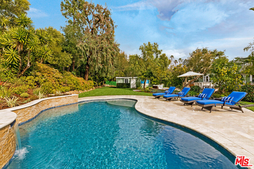 20779 Big Rock Drive Malibu, CA 90265 - Photo 31 of 37 a view of a swimming pool with a patio