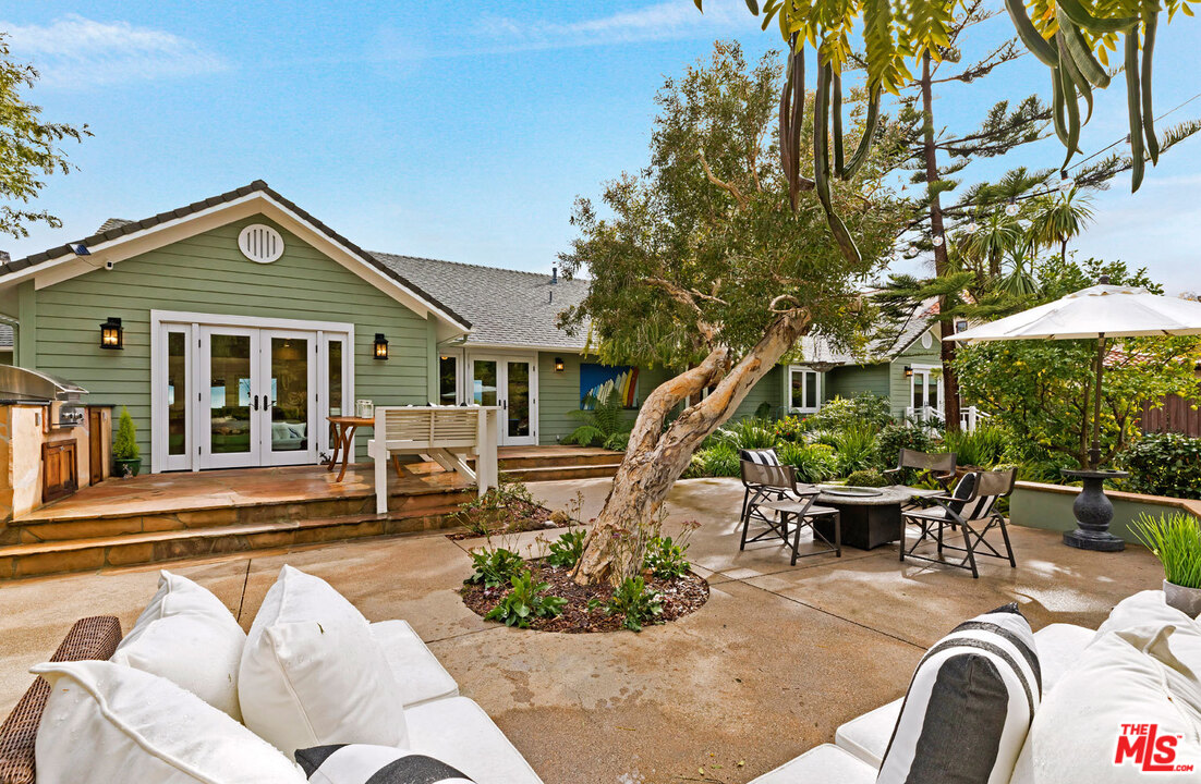 20779 Big Rock Drive Malibu, CA 90265 - Photo 36 of 37 a view of a house with a chairs in patio