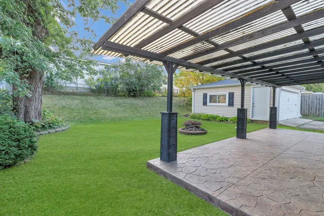 a view of a porch with a backyard