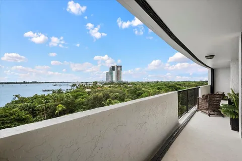 a bathroom with a sink toilet and mirror