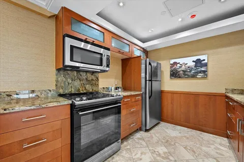 a view of a porch with potted plants