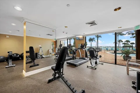 a kitchen with stainless steel appliances granite countertop a stove and a refrigerator