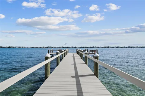 a view of a yard and front view of a house