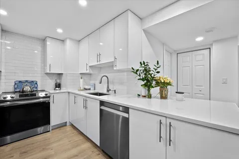 a living room with furniture fireplace and a flat screen tv