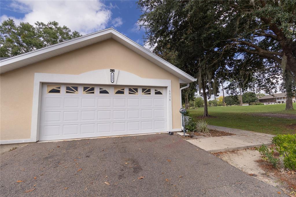 6494 Northwest 109th Place Alachua, FL 32615 - Photo 1 of 19 a view of a house with a yard