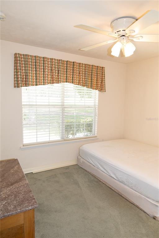6494 Northwest 109th Place Alachua, FL 32615 - Photo 16 of 19 a bathroom with a bathtub and a window