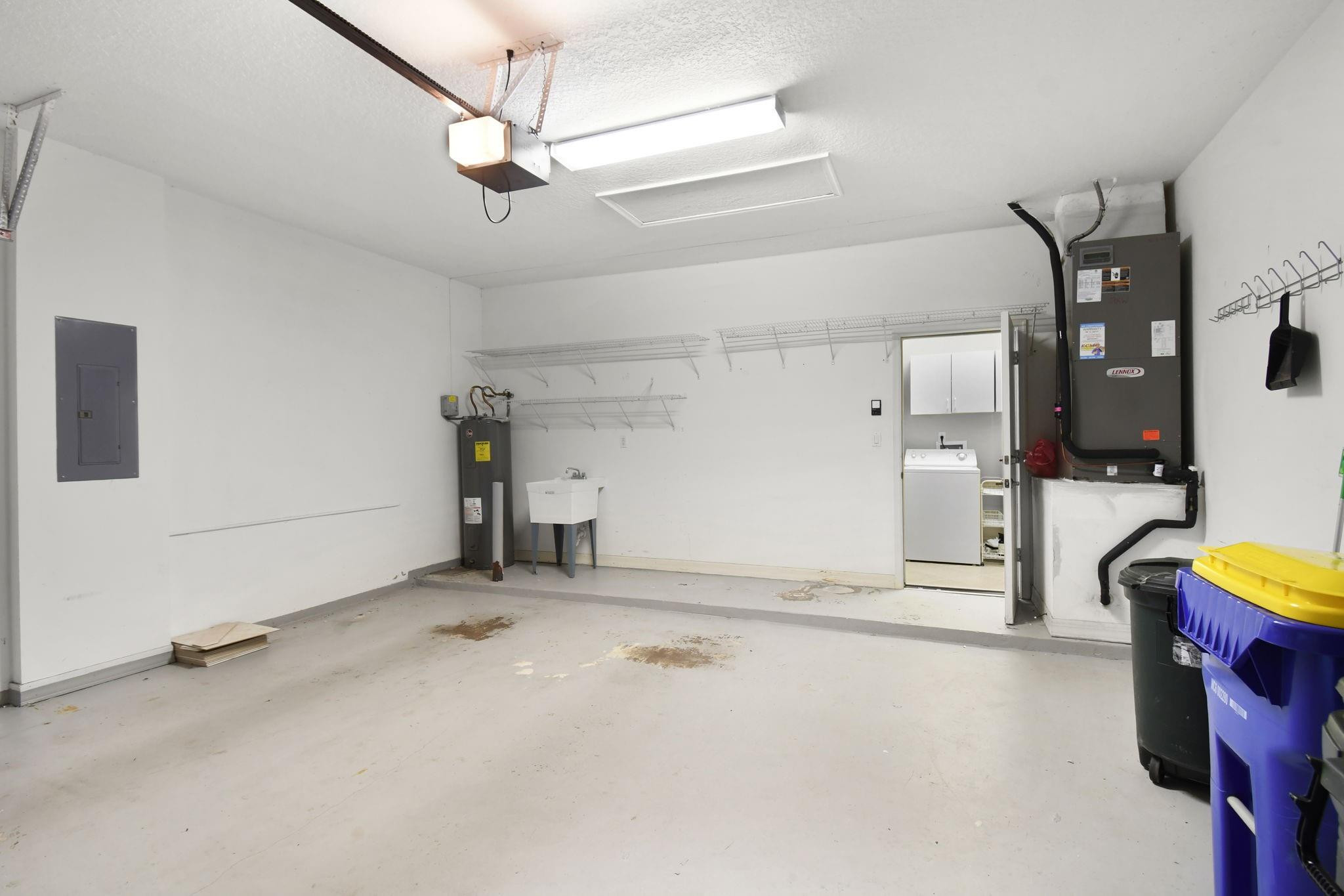 7084 Southeast Cricket Court Stuart, FL 34997 - Photo 32 of 60 2 CAR GARAGE WITH ATTIC ACCESS