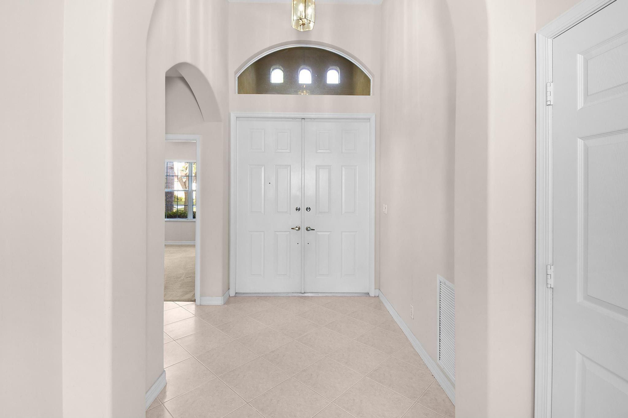 7084 Southeast Cricket Court Stuart, FL 34997 - Photo 5 of 60 NICE FOYER ENTRANCE