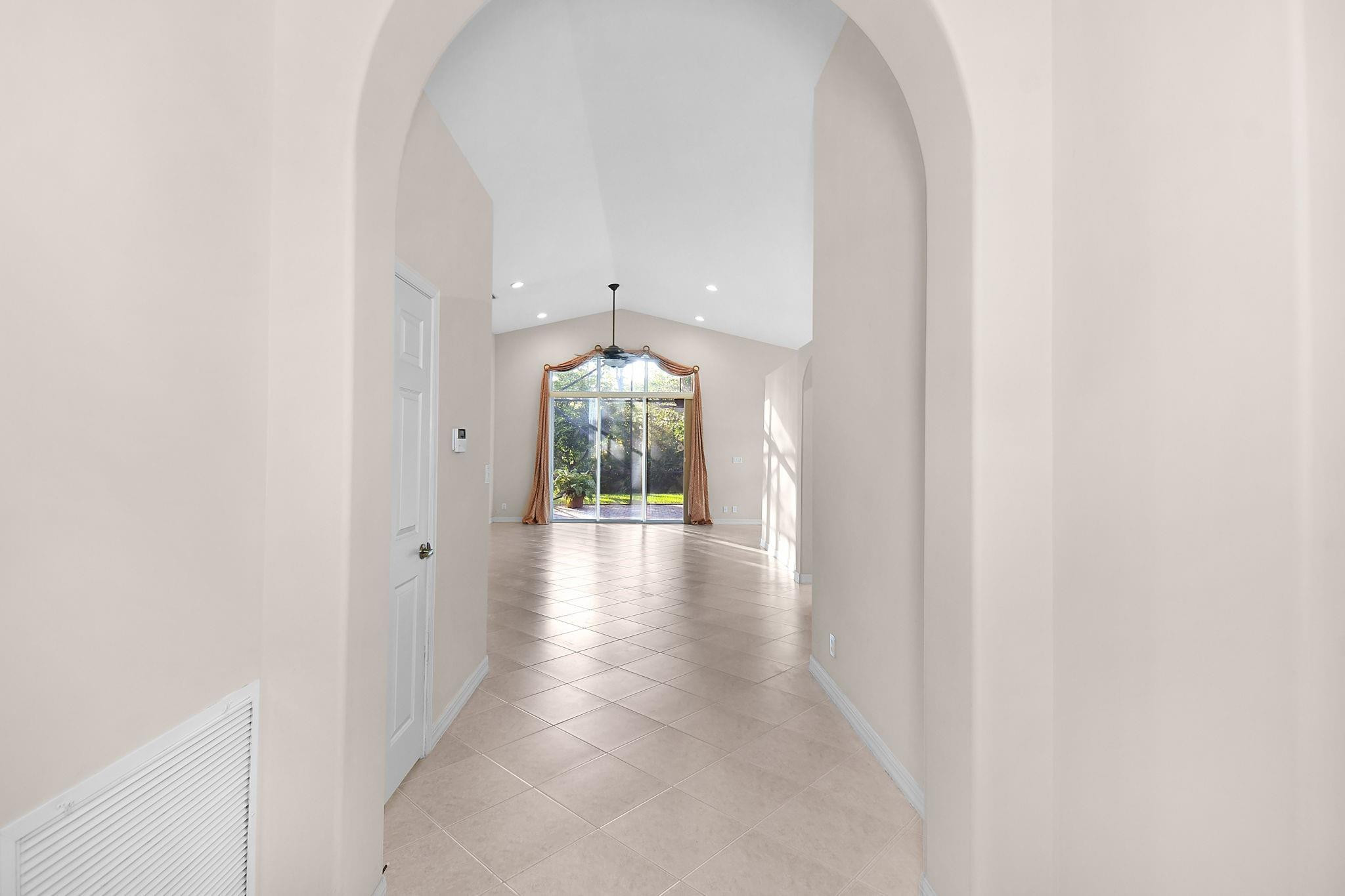 7084 Southeast Cricket Court Stuart, FL 34997 - Photo 6 of 60 TILES FLOORS IN MAIN LIVING AREA