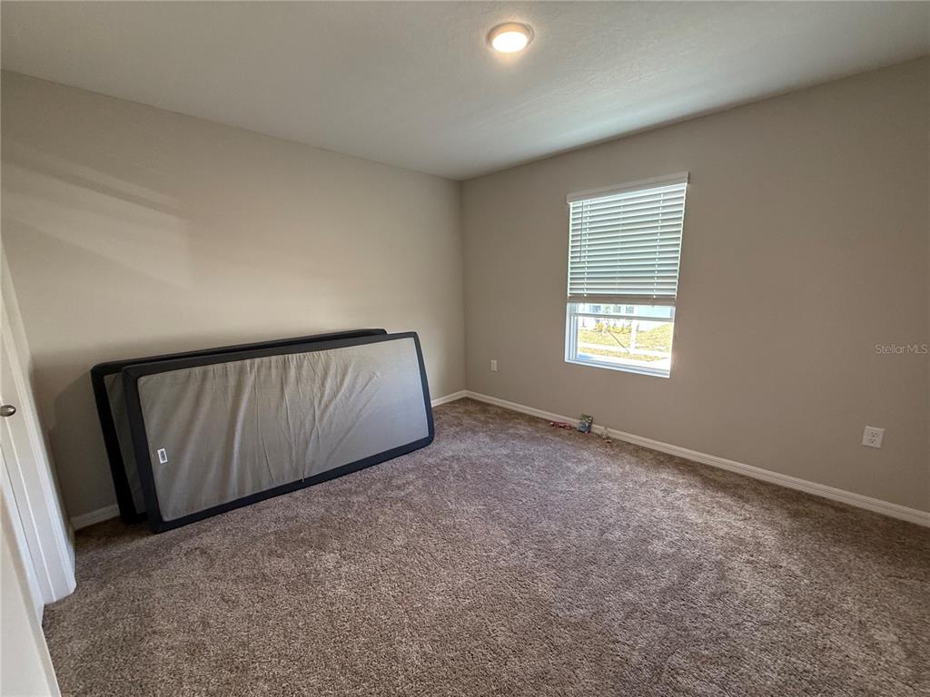 3464 Dahlia Drive Haines City, FL 33844 - Photo 31 of 41 a view of an empty room and window