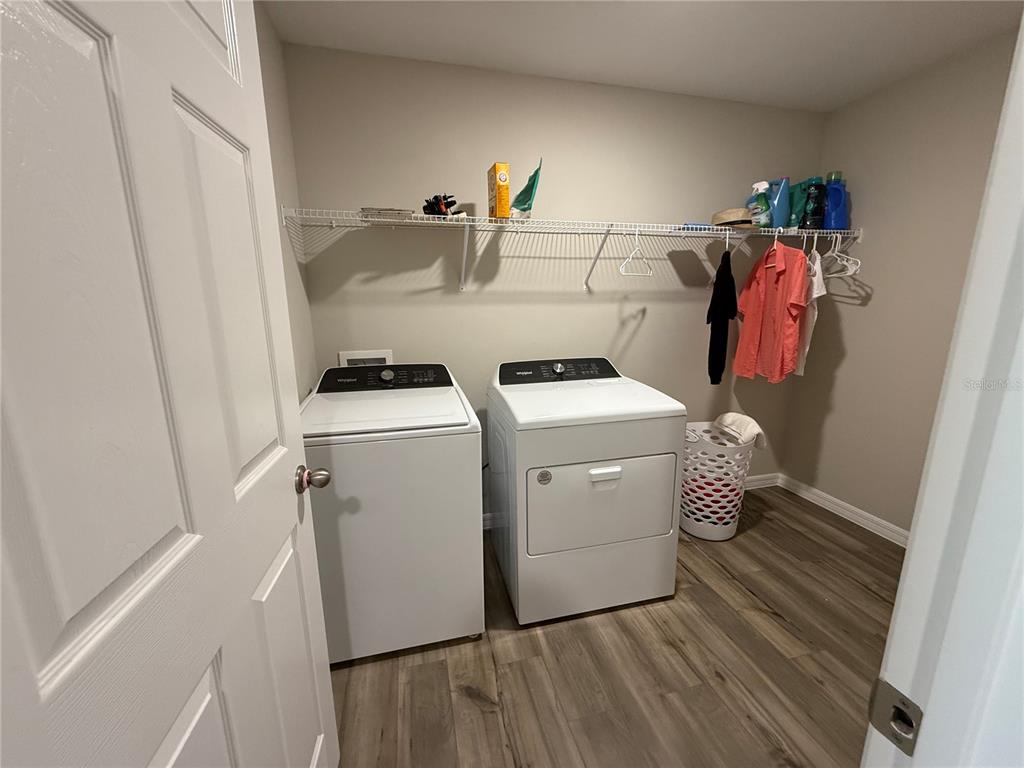 3464 Dahlia Drive Haines City, FL 33844 - Photo 33 of 41 a utility room with dryer and washer
