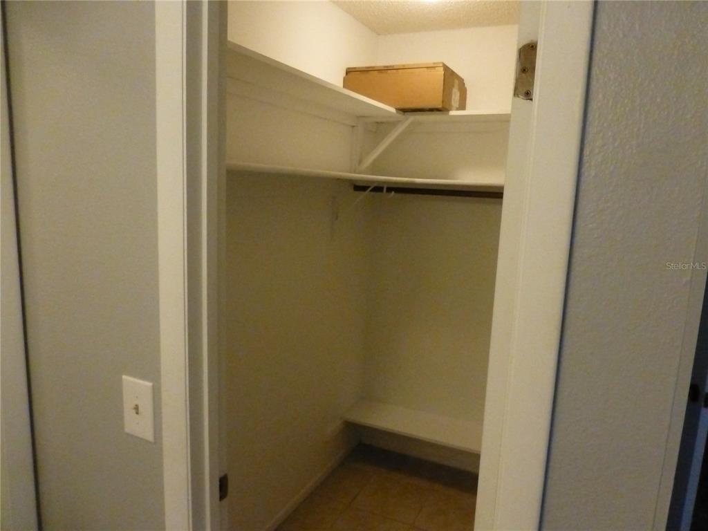 1890 Wolford Road, Unit 5 Clearwater, FL 33760 - Photo 14 of 29 a small room with a door
