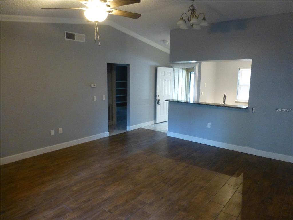 1890 Wolford Road, Unit 5 Clearwater, FL 33760 - Photo 8 of 29 a view of an empty room with a window