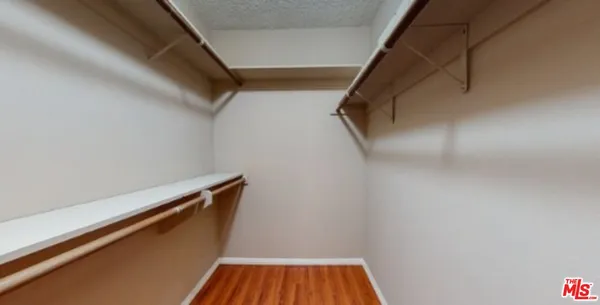 a view of small space with racks on the wall