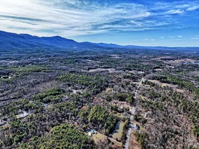 a bedroom with a bed and a closet