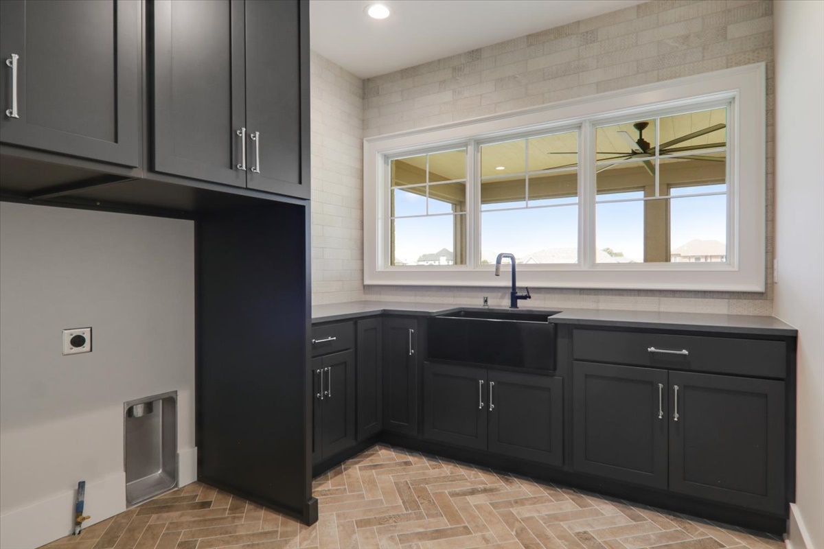 604 Cayman Way Savoy, IL 61874 - Photo 20 of 82 a kitchen with a sink and a window