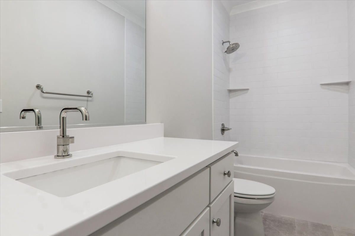 604 Cayman Way Savoy, IL 61874 - Photo 23 of 82 a bathroom with a sink and a vanity