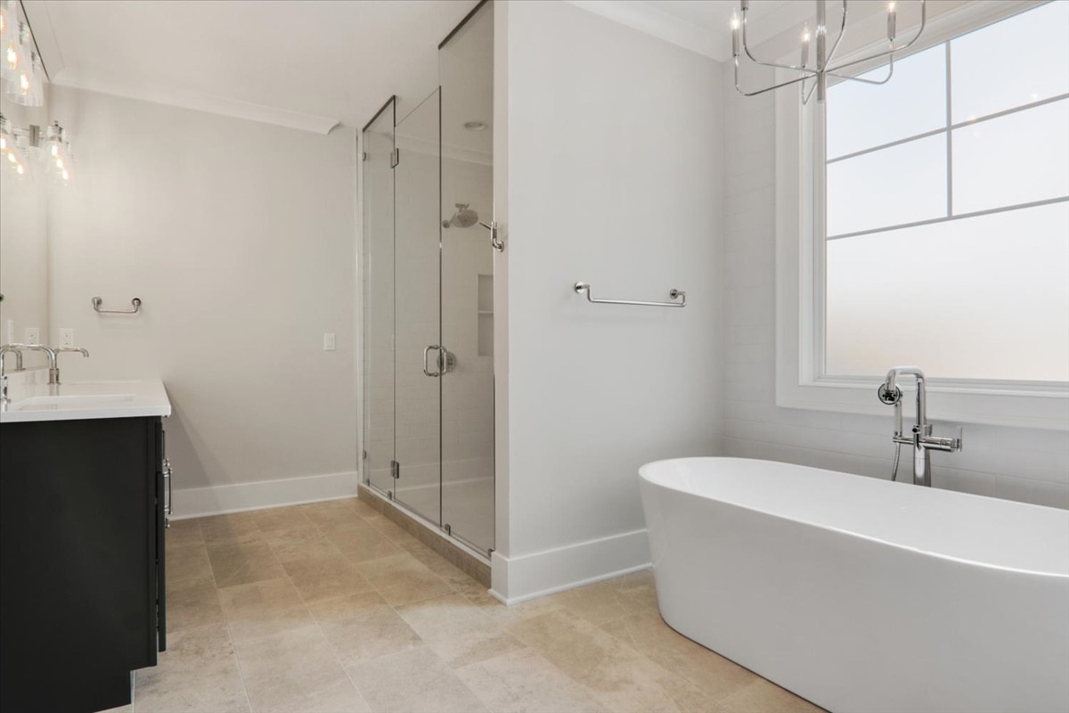 604 Cayman Way Savoy, IL 61874 - Photo 31 of 82 a bathroom with a bathtub and shower