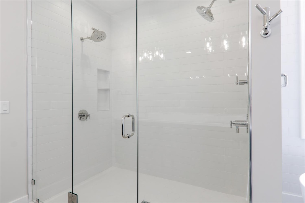 604 Cayman Way Savoy, IL 61874 - Photo 33 of 82 a bathroom with a shower and a mirror