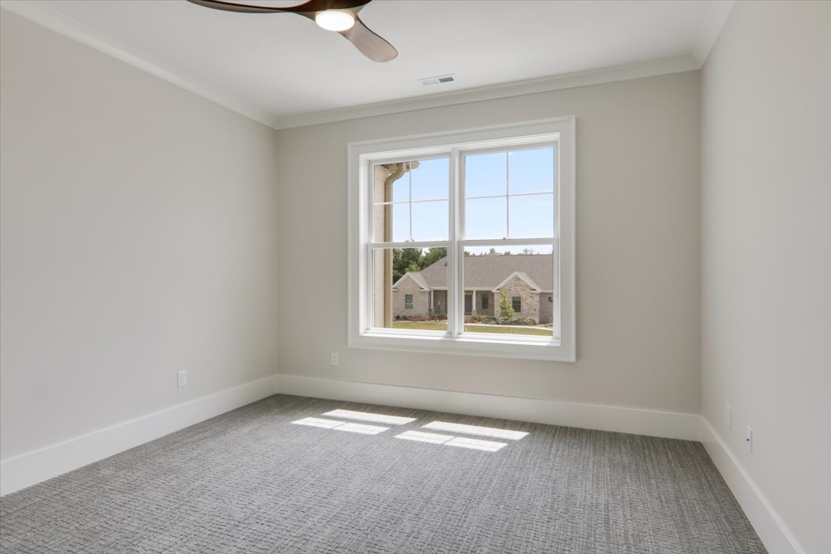 604 Cayman Way Savoy, IL 61874 - Photo 35 of 82 an empty room with windows
