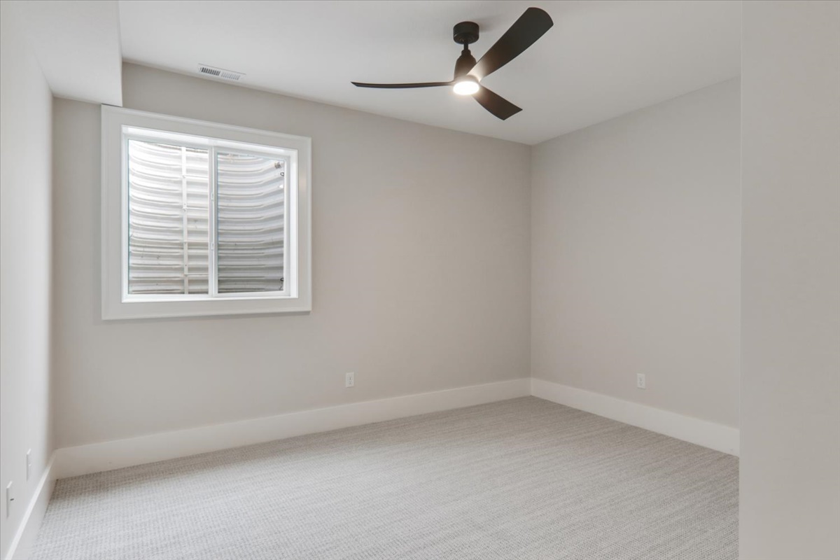 604 Cayman Way Savoy, IL 61874 - Photo 42 of 82 an empty room with a window