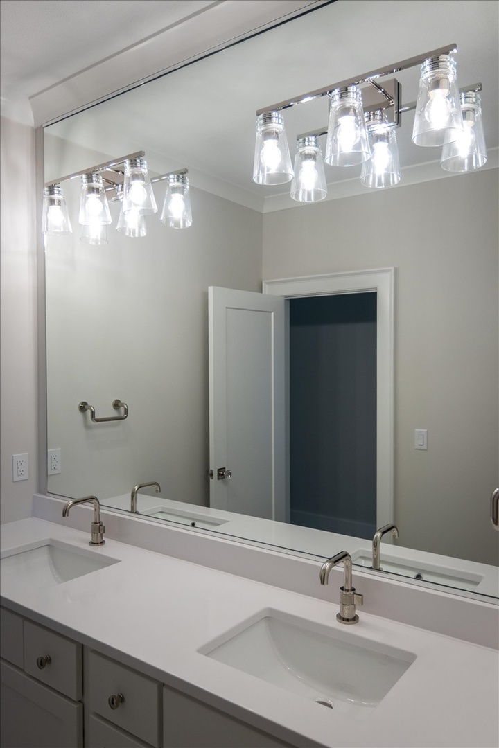 604 Cayman Way Savoy, IL 61874 - Photo 62 of 82 a bathroom with a sink and a mirror